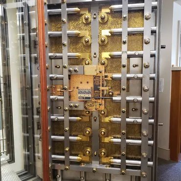 Brass and steel vault door with locking bolts